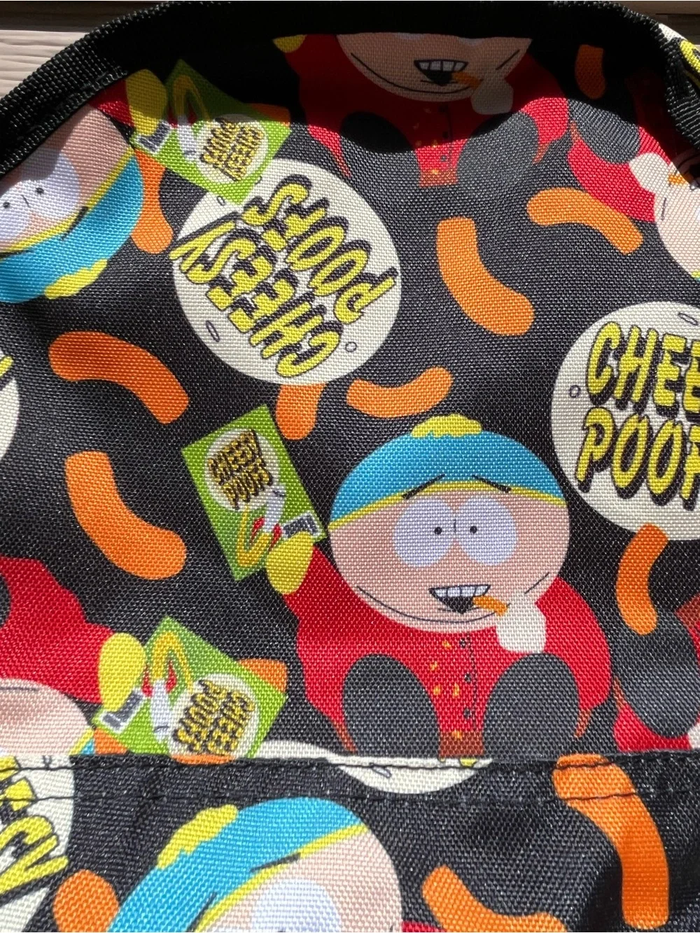South Park Eric Cartman Cheesy Poofs Reversible Flip Pak Backpack Character Bag